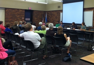 On June 17th, about 40 people listened to a panel discussion featuring volunteers and refugees.